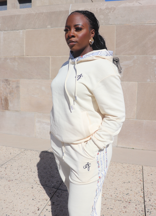 Cream loungewear set for women with hoodie and wide-leg sweatpants featuring subtle logo detail – Atielah Fashion